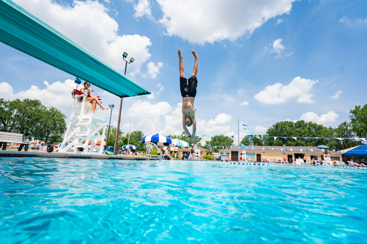 A boy diving into water