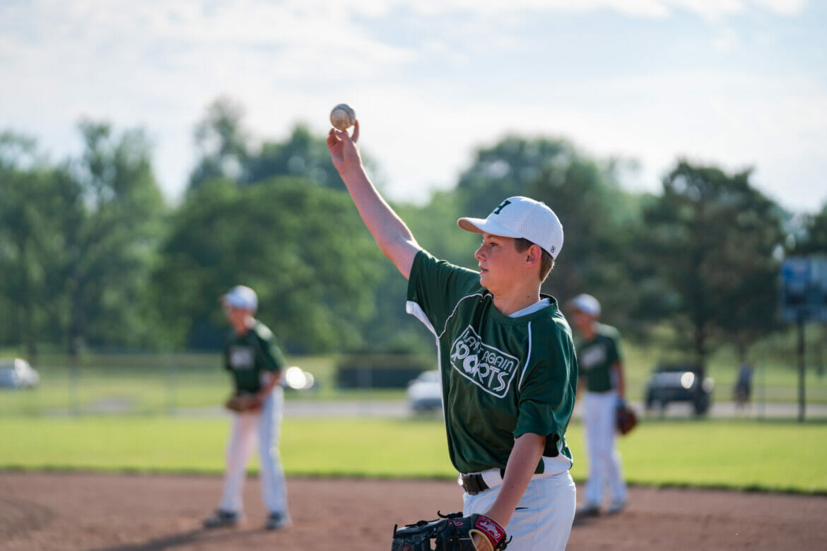 A boy catching a ball