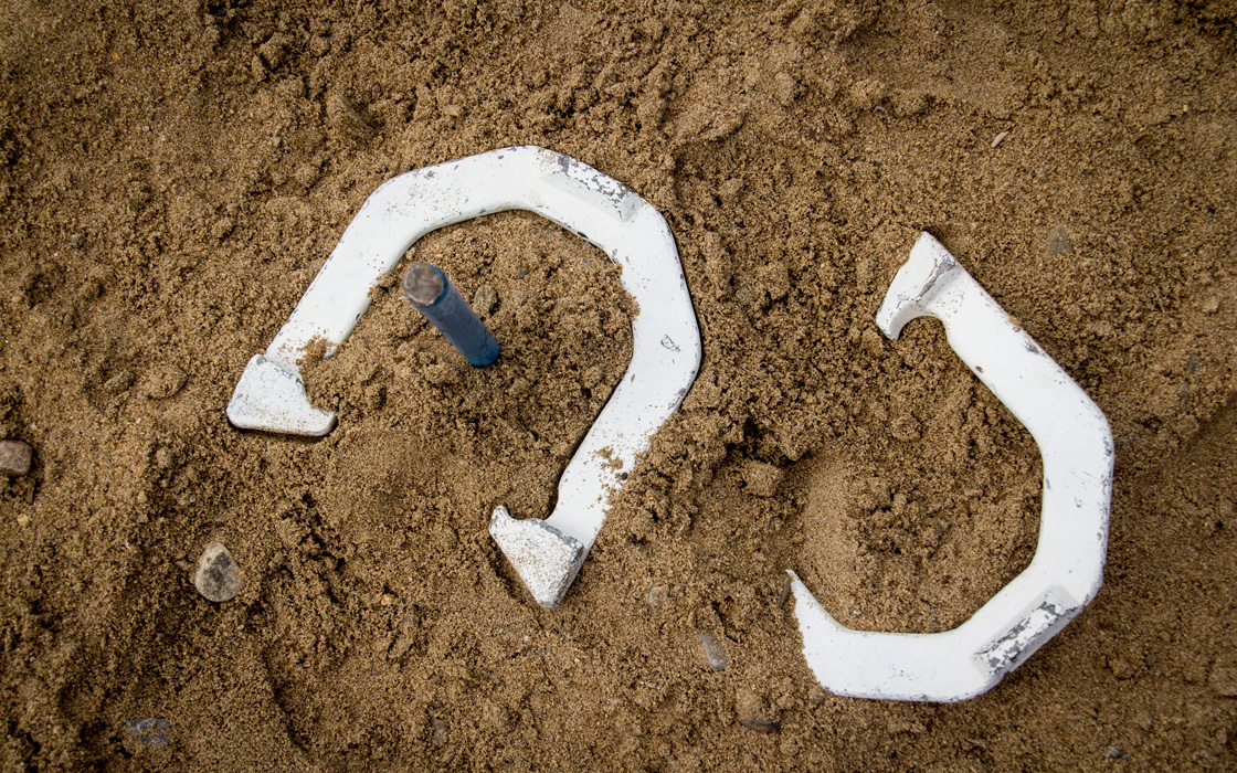 Horseshoes in a sand pit