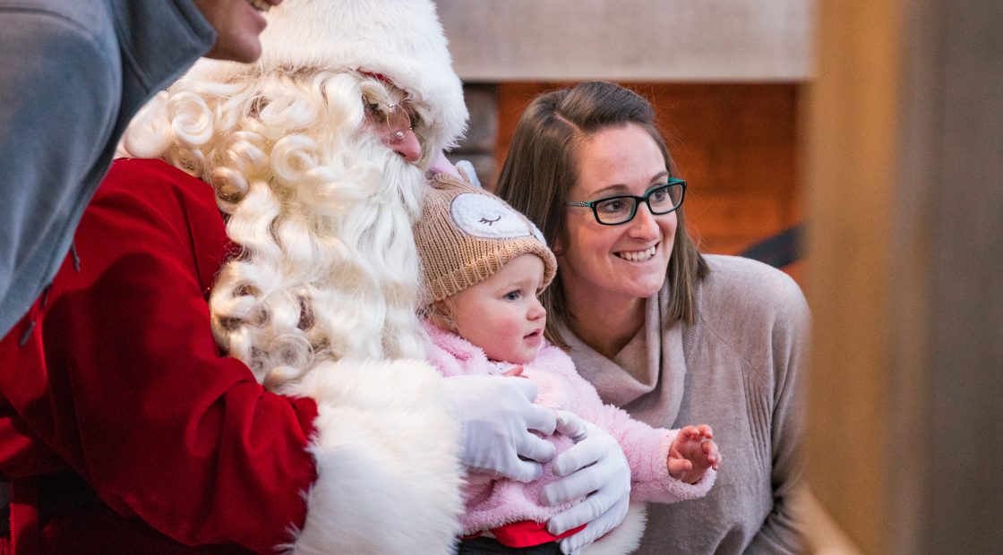 Family posing with santa